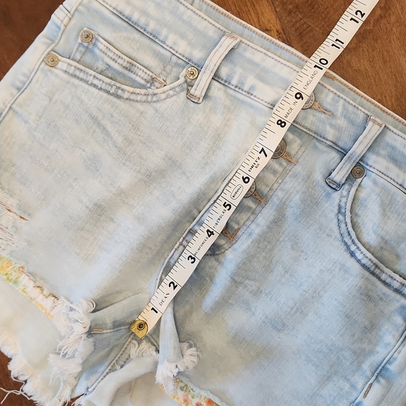 American Eagle Next Level Stretch High-Waisted Distressed Denim Shorts - Picture 10 of 11